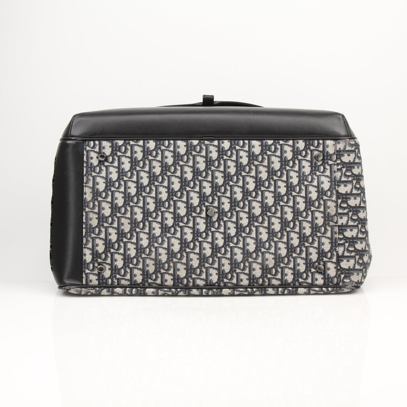 Christian Dior Oblique dog carrier travel bag with adjustable strap and mesh ventilation for comfortable pet transportation.