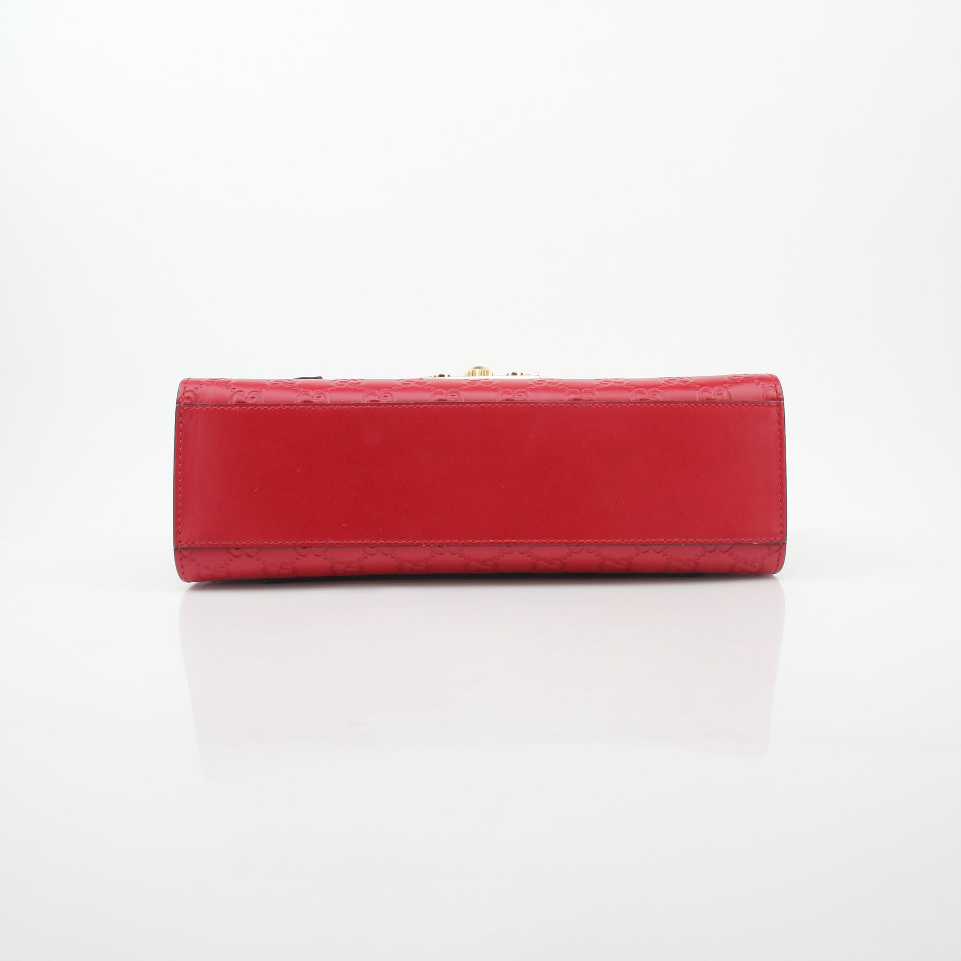 Gucci red GG signature padlock medium shoulder handbag with gold hardware and adjustable strap.