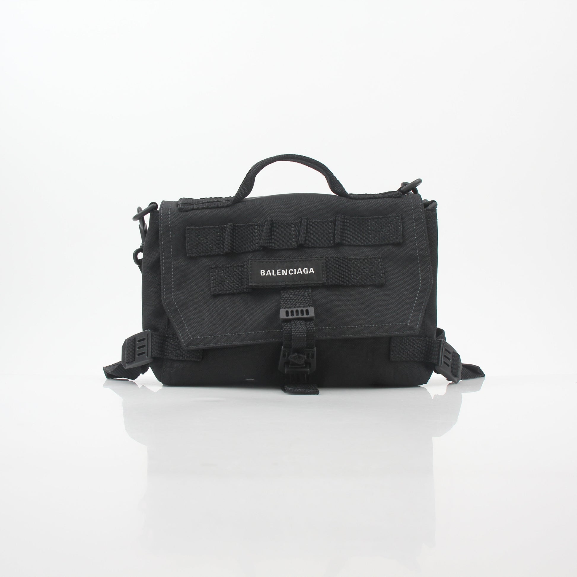 Black Balenciaga Army Messenger Bag by Gold & Beyond, stylish handbag with adjustable strap and front flap closure.
