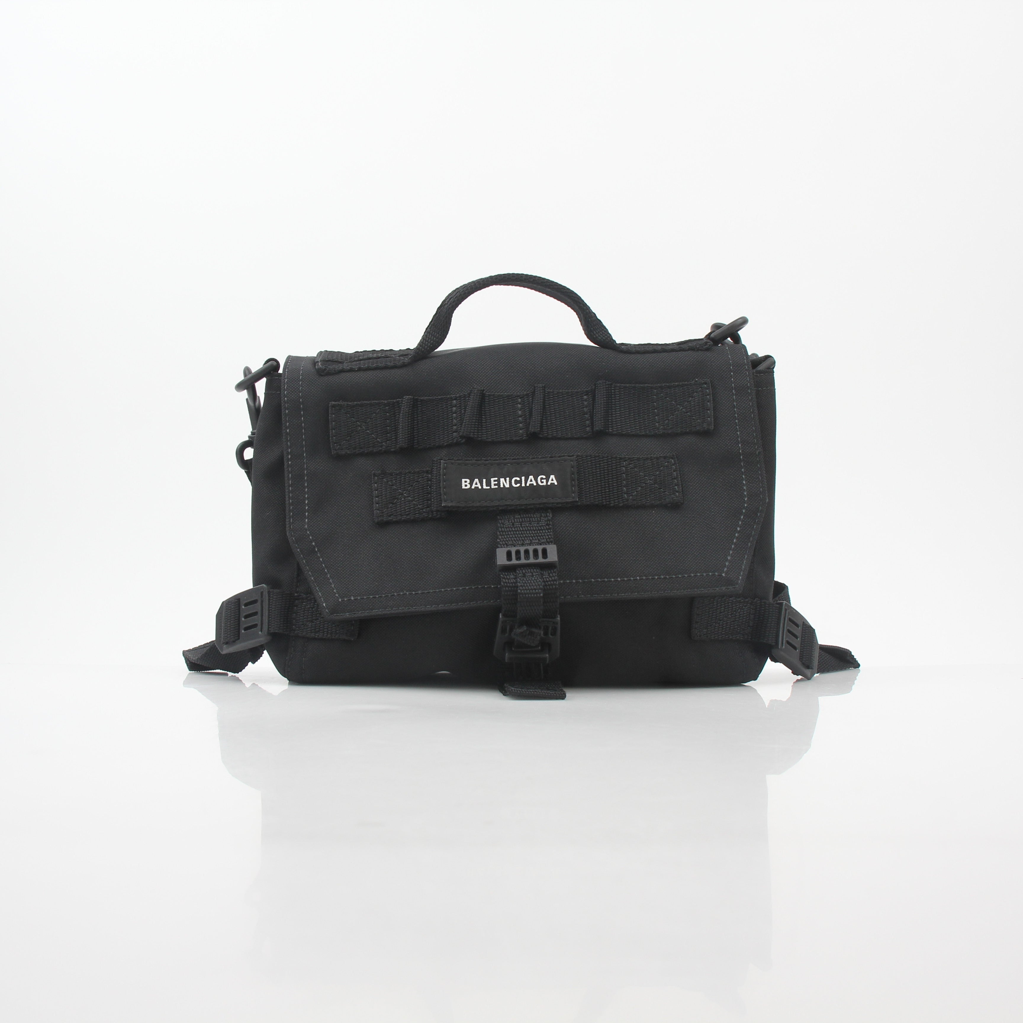 Black Balenciaga Army Messenger Bag by Gold & Beyond, stylish handbag with adjustable strap and front flap closure.