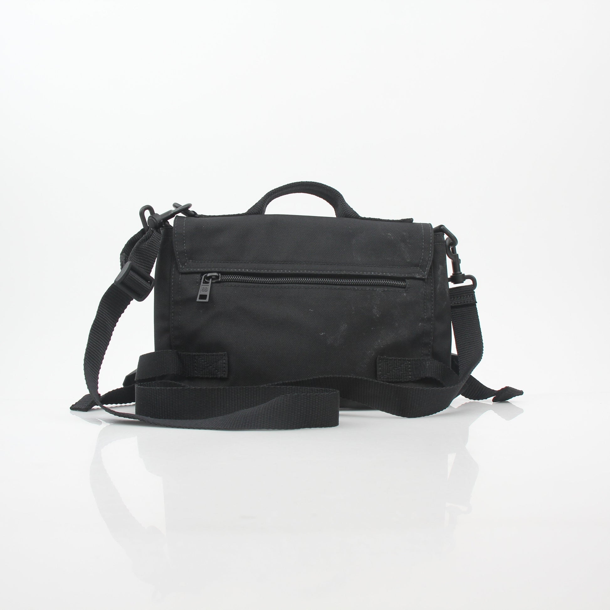 Black Balenciaga Army Messenger Bag by Gold & Beyond, featuring a structured handbag with adjustable strap and signature design.
