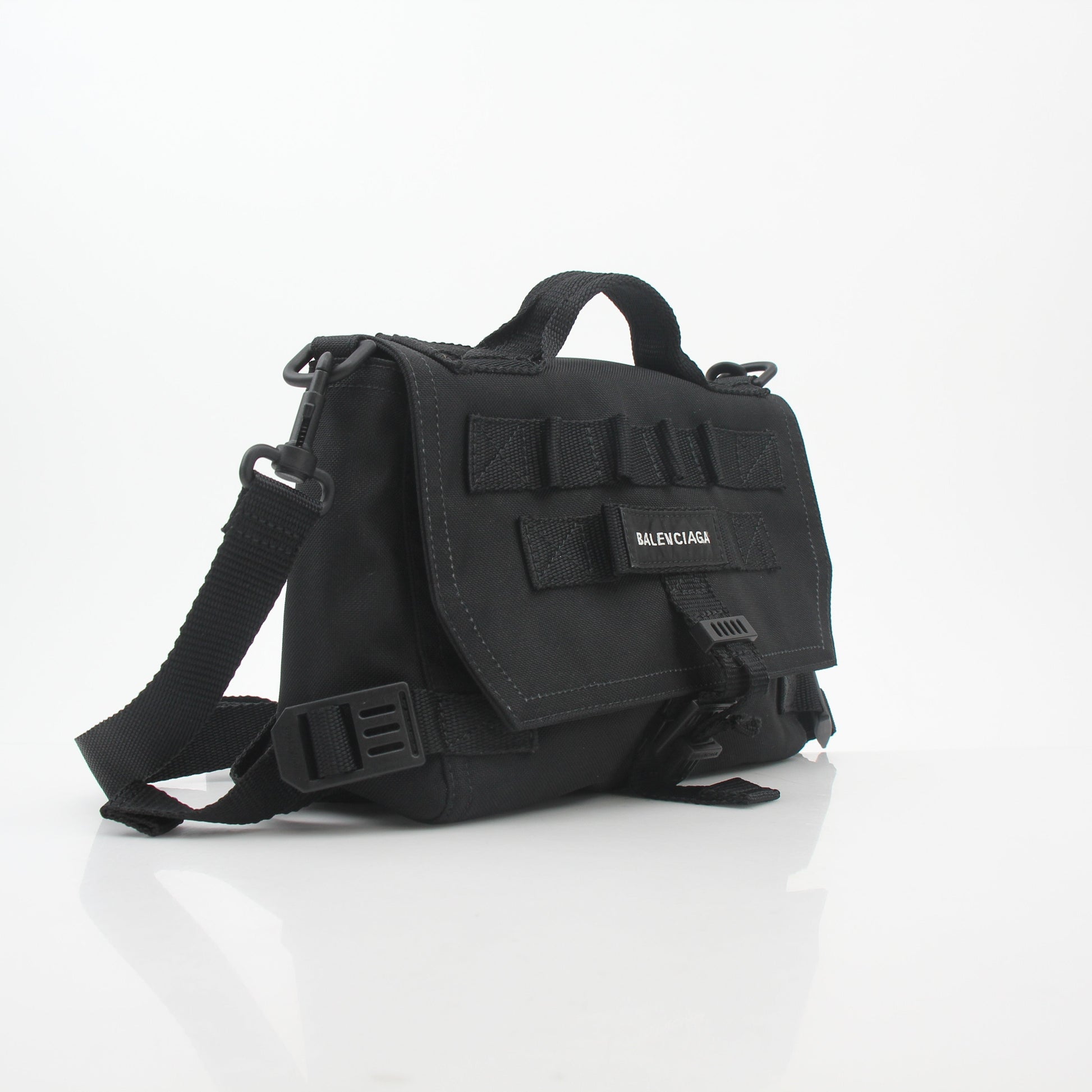 Balenciaga black army messenger handbag with adjustable strap and front flap, featuring silver hardware and logo detail.