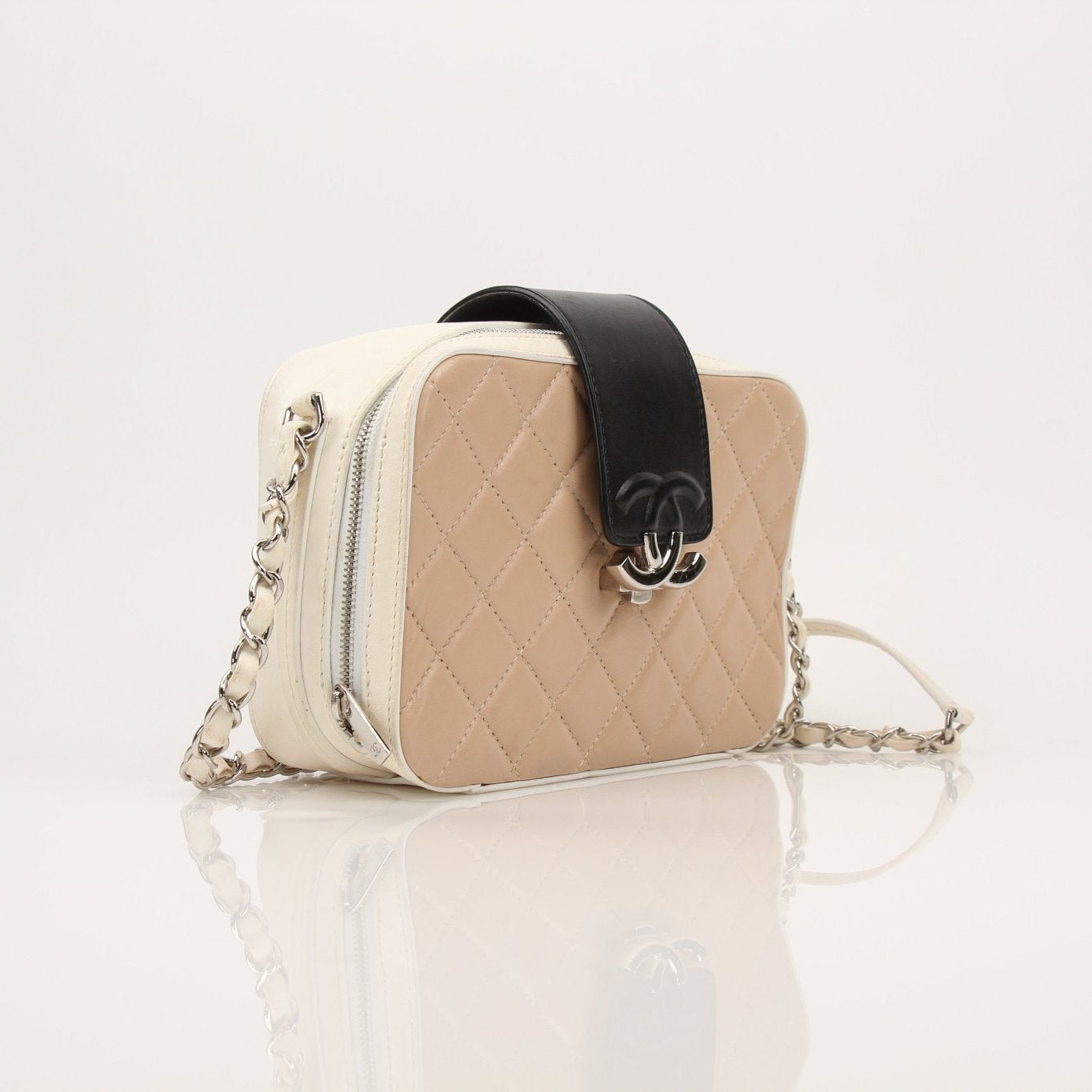Gold & Beyond Chanel Two-Tone Quilted Mini Flap Handbag with gold chain strap and signature quilting detail.