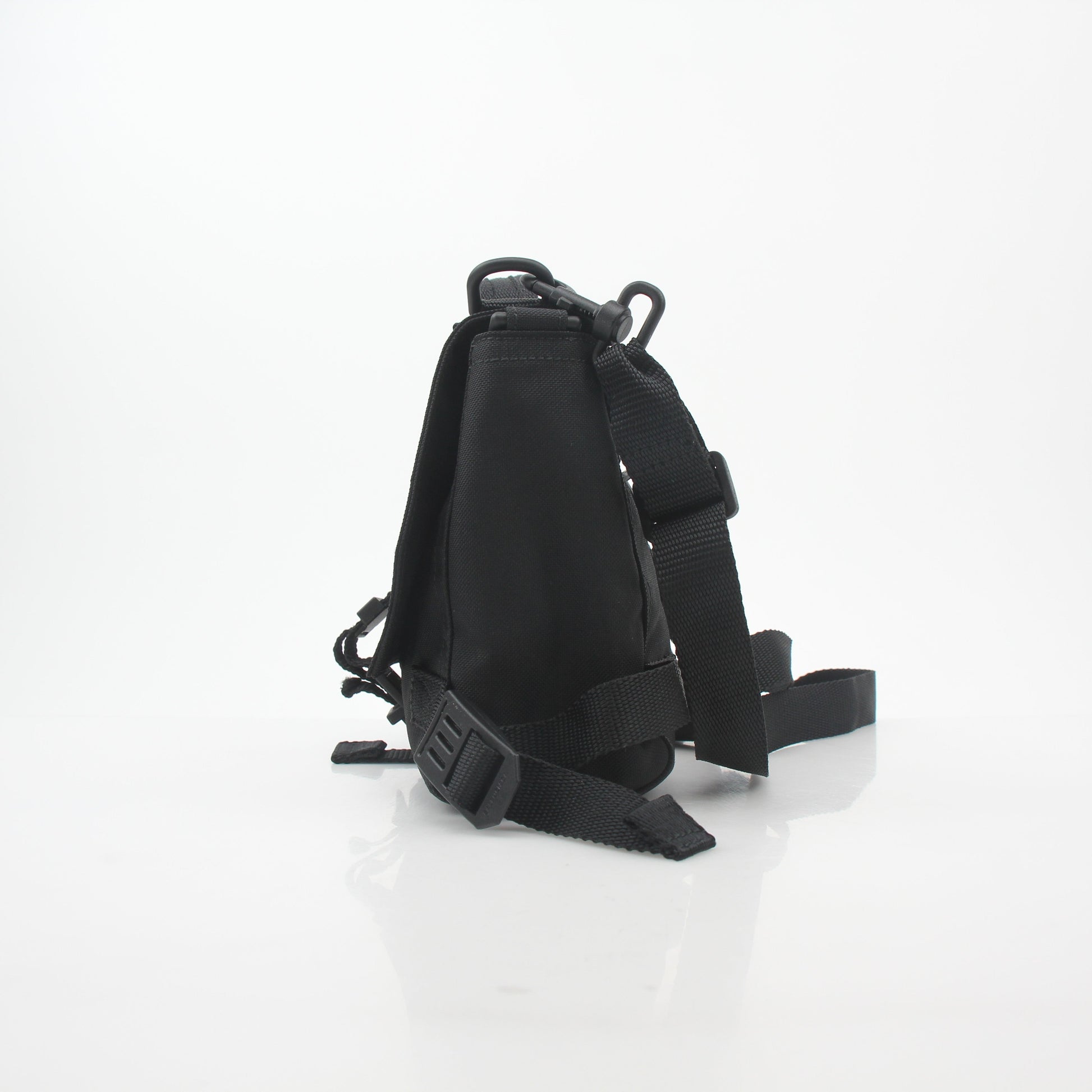 Gold & Beyond black Balenciaga Army Messenger Bag handbag with adjustable strap and front flap closure.