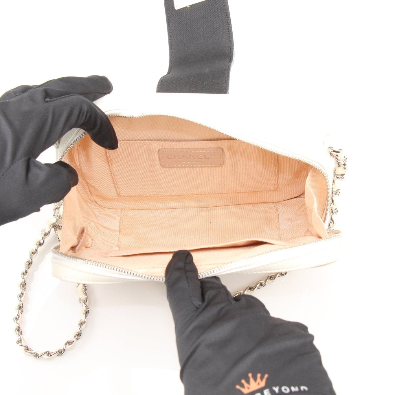 Gold & Beyond Chanel Two-Tone Quilted Mini Flap Handbag with gold chain strap and signature quilting detail.