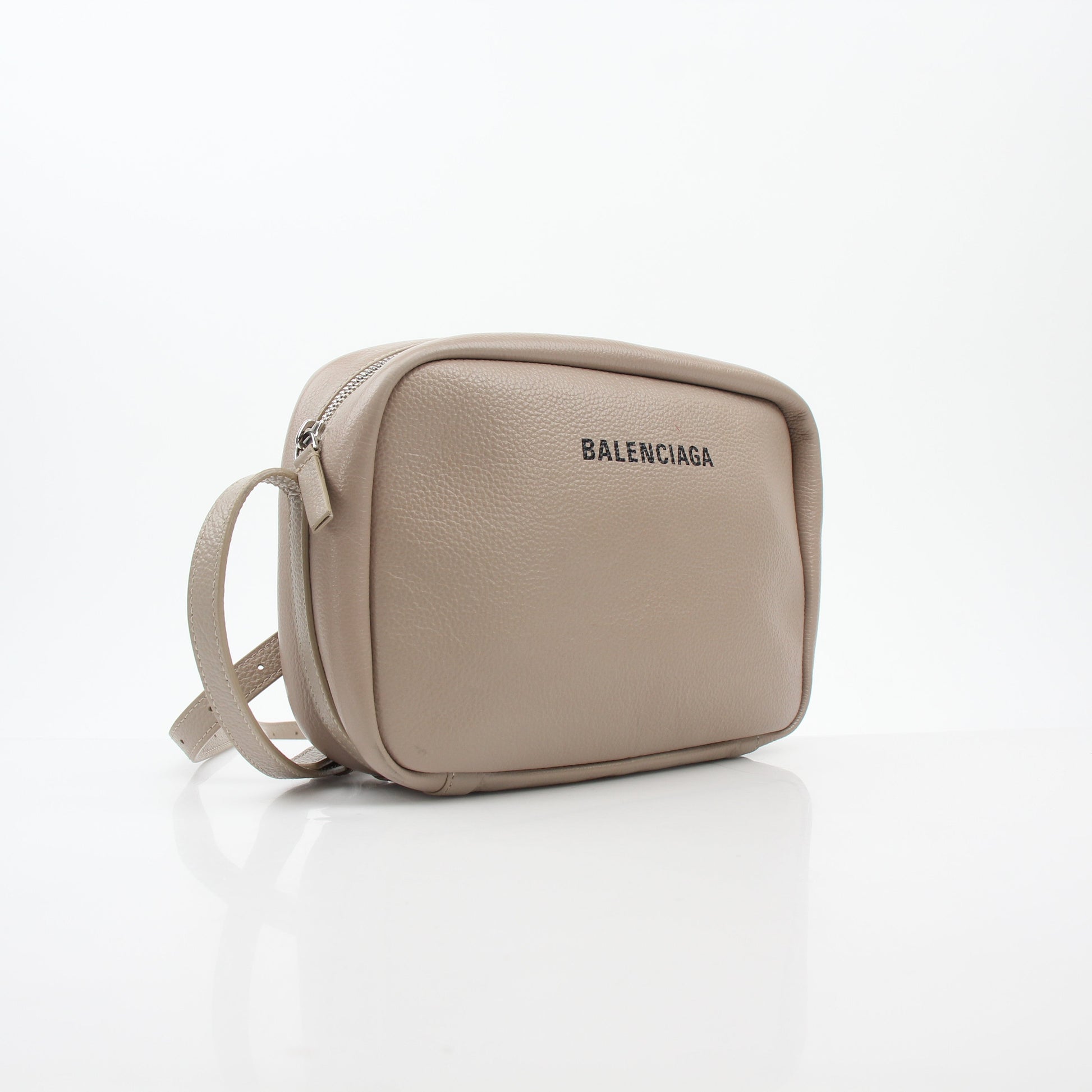 Beige Balenciaga Everyday Camera Bag handbag with gold accents, featuring adjustable strap and signature design details.