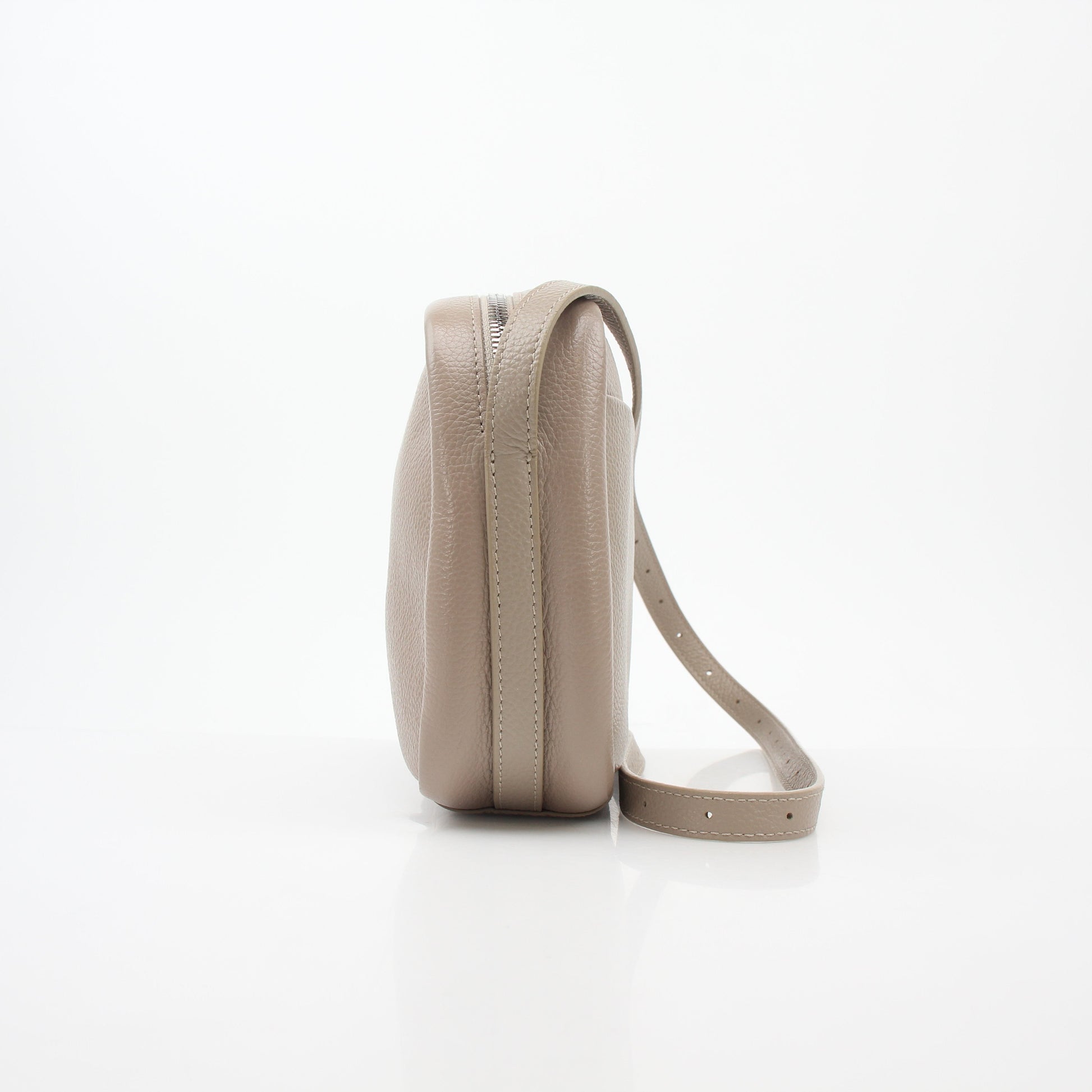 Beige Balenciaga Everyday Camera Bag handbag with gold hardware and adjustable strap, stylish and compact for daily use.