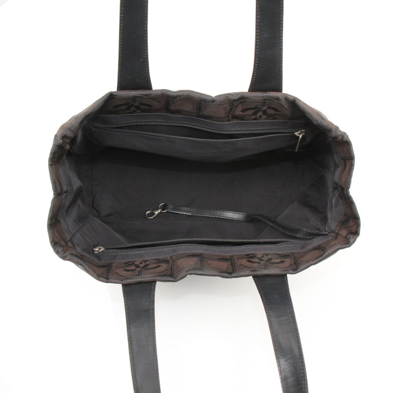 Gold & Beyond Chanel checked nylon tote handbag with top handles and spacious interior, showcasing a stylish and functional design.