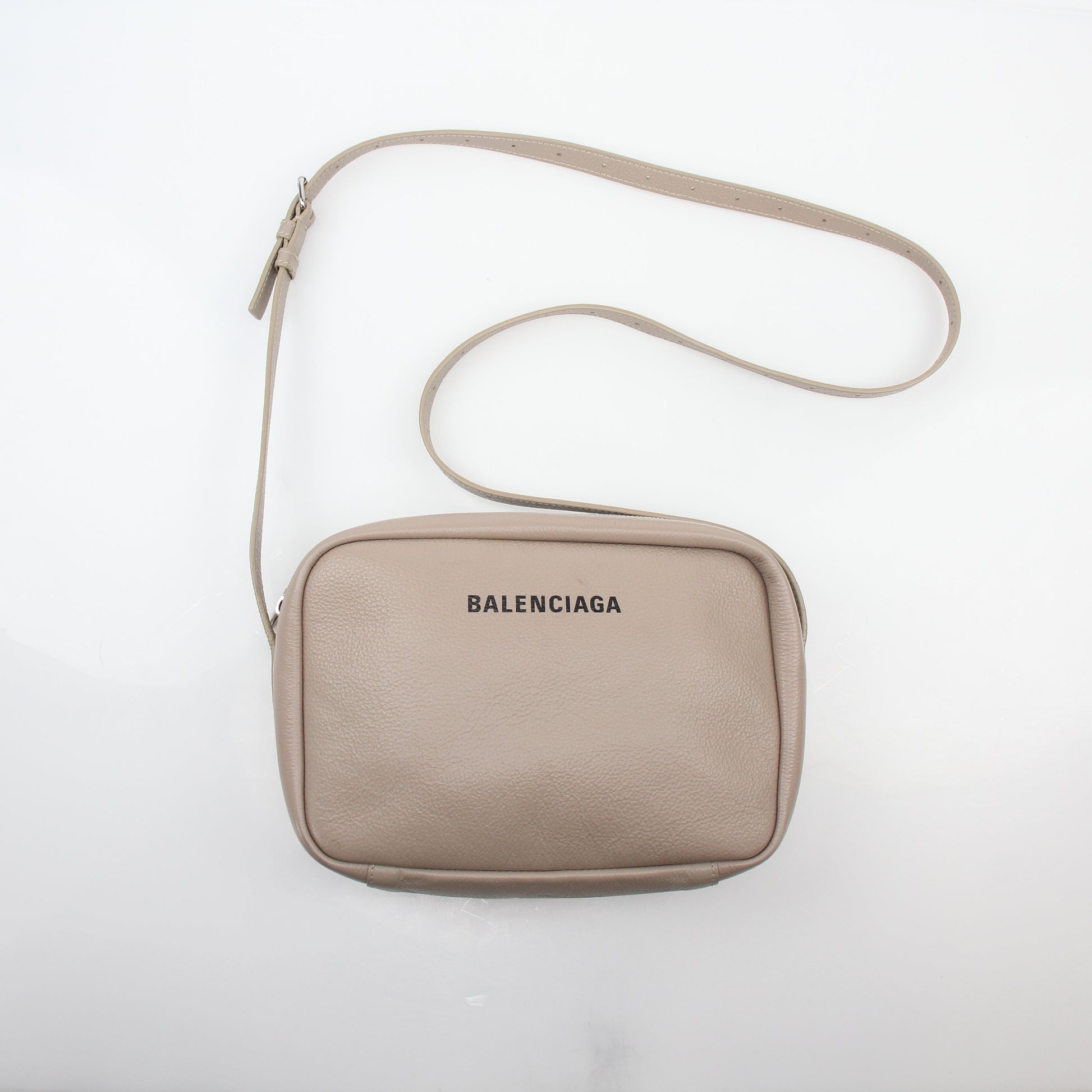 Beige Balenciaga Everyday Camera Bag handbag with gold accents, featuring a structured design and adjustable strap.