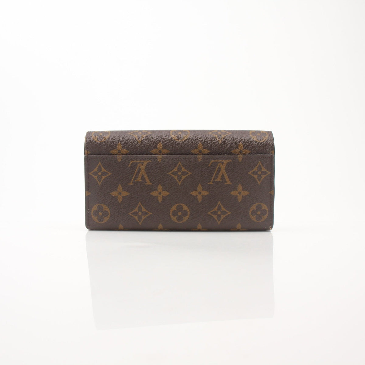 Louis Vuitton Monogram Sarah Wallet by Gold & Beyond, featuring classic monogram canvas and gold-tone hardware on a sleek wallet.