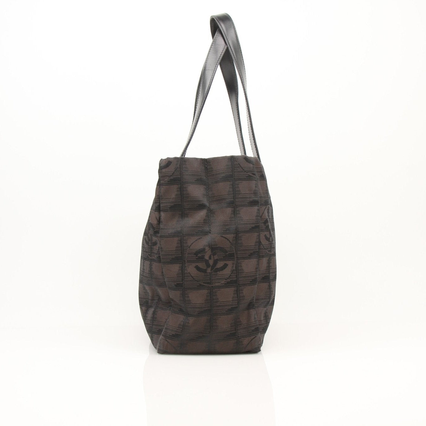 Gold & Beyond Chanel checked nylon tote handbag with top handles and spacious interior for everyday use.