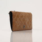 Gold & Beyond Chanel crinkled patent wallet on chain, stylish designer wallet with gold chain and textured patent finish.