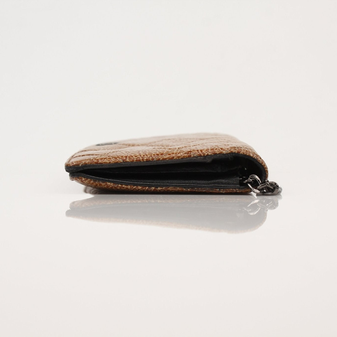 Chanel Crinkled Patent Wallet on Chain by Gold & Beyond, featuring a sleek, textured patent leather wallet with chain strap.