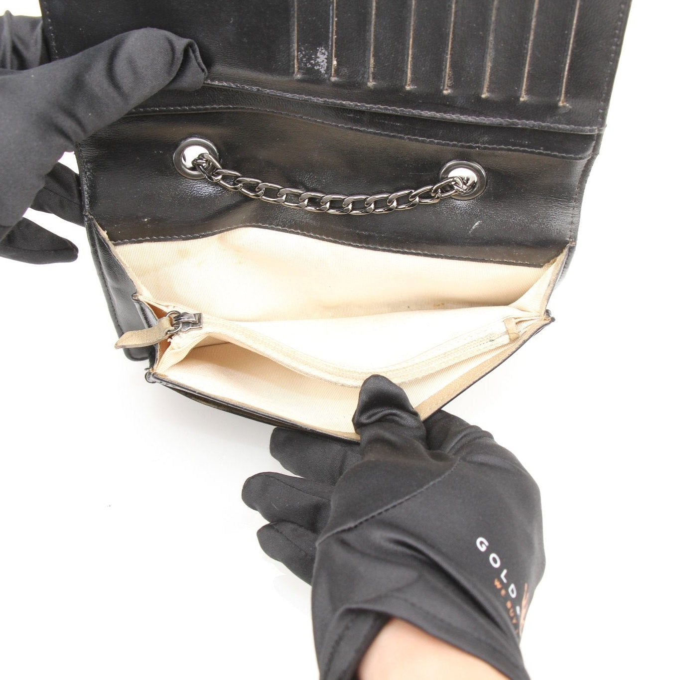 Chanel crinkled patent wallet on chain in gold color, featuring a compact design with a chain strap and elegant finish.