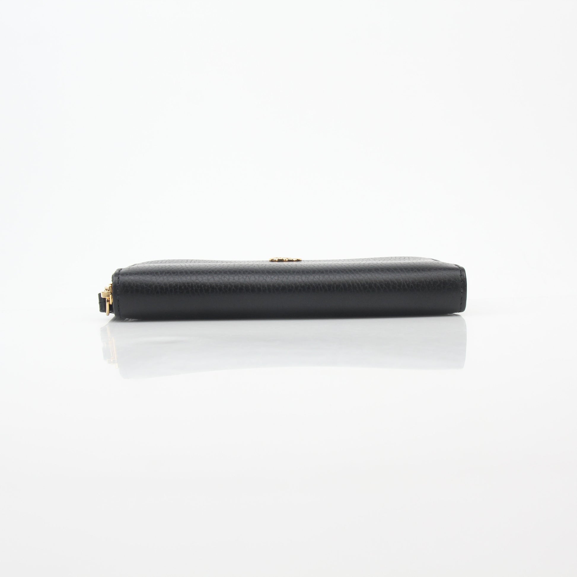 Gucci Black GG Marmont zip-around wallet with gold hardware, leather exterior, and embossed GG logo for stylish organization.