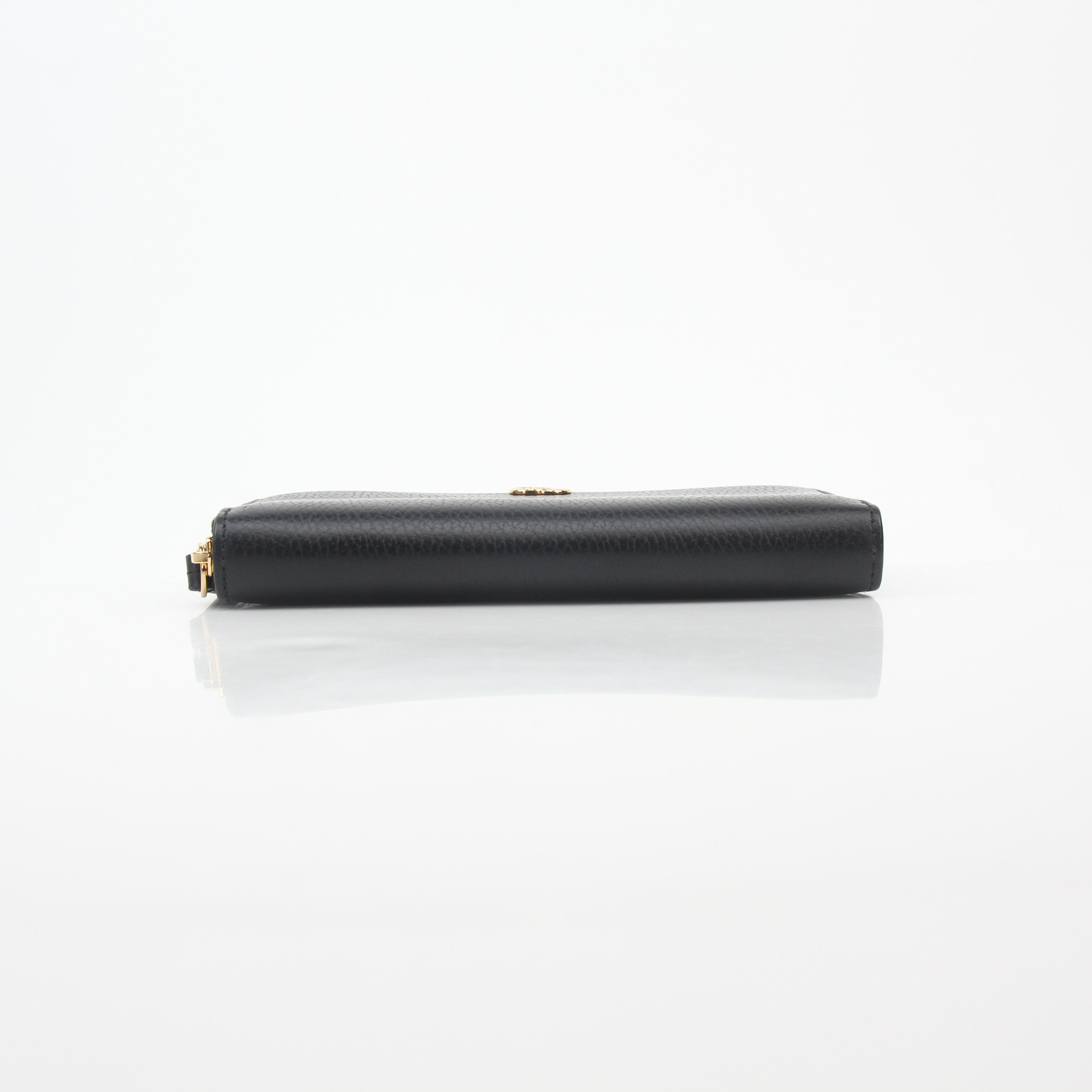 Gucci Black GG Marmont zip-around wallet with gold hardware, leather exterior, and embossed GG logo for stylish organization.