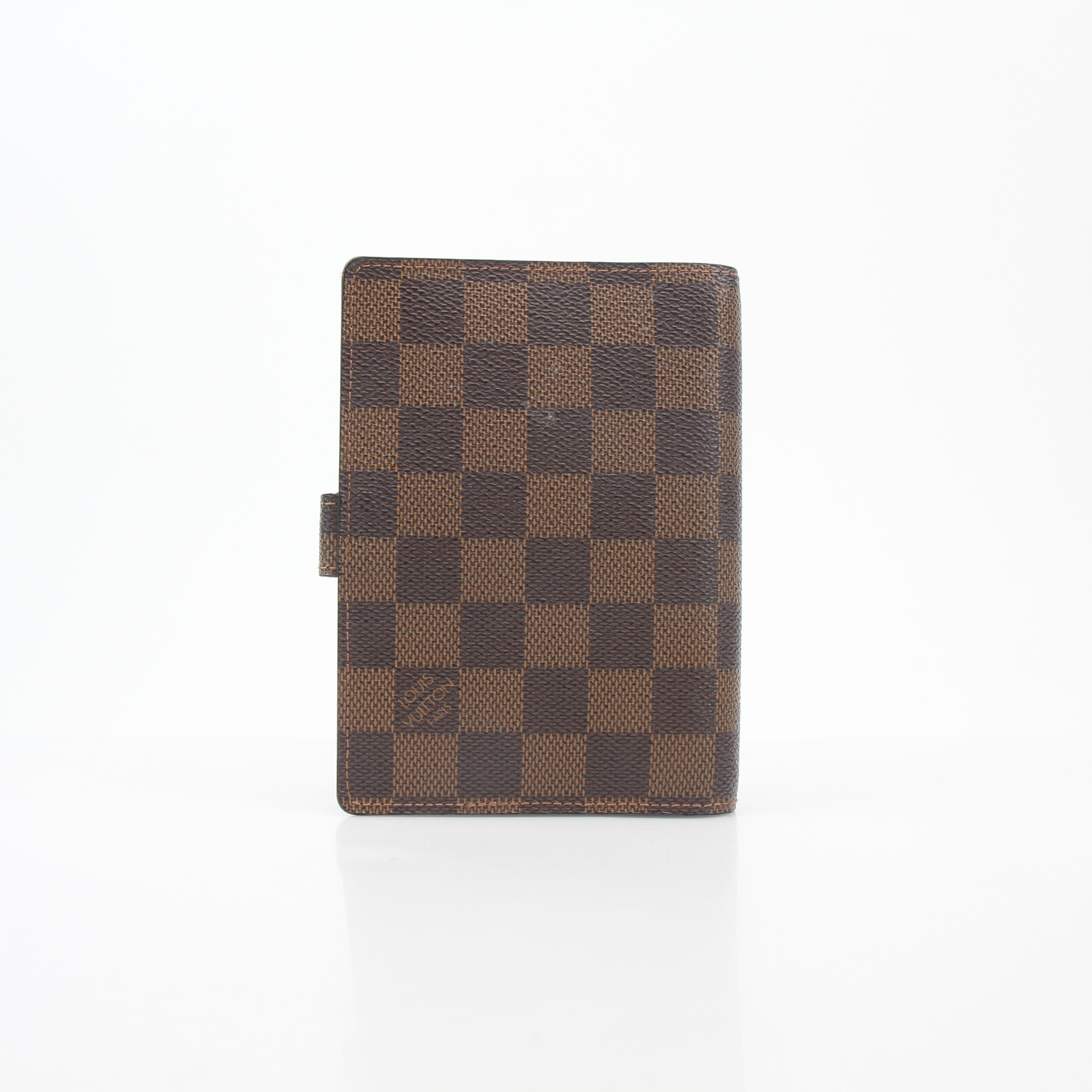 Louis Vuitton Damier Ebene Ring Agenda PM cover, luxury accessories with brown checkerboard pattern and gold branding details.