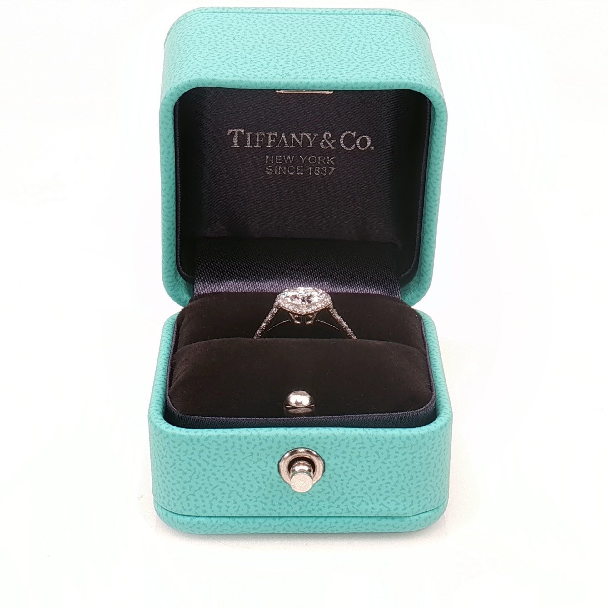 Gold & Beyond Tiffany & Co. Soleste heart-shaped diamond ring with sparkling center stone and elegant band, jewelry accessory.