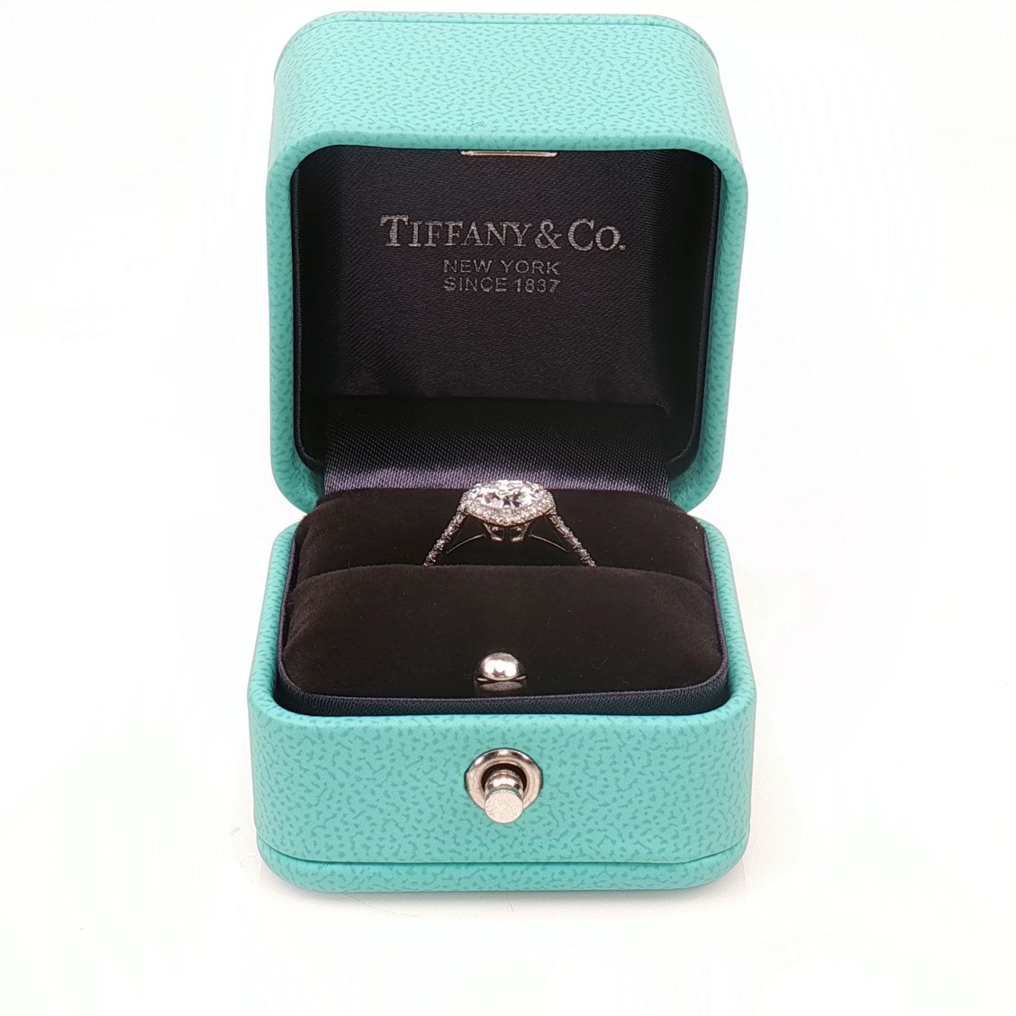 Gold & Beyond Tiffany & Co. Soleste heart-shaped diamond ring showcasing a sparkling diamond set in elegant jewelry design.