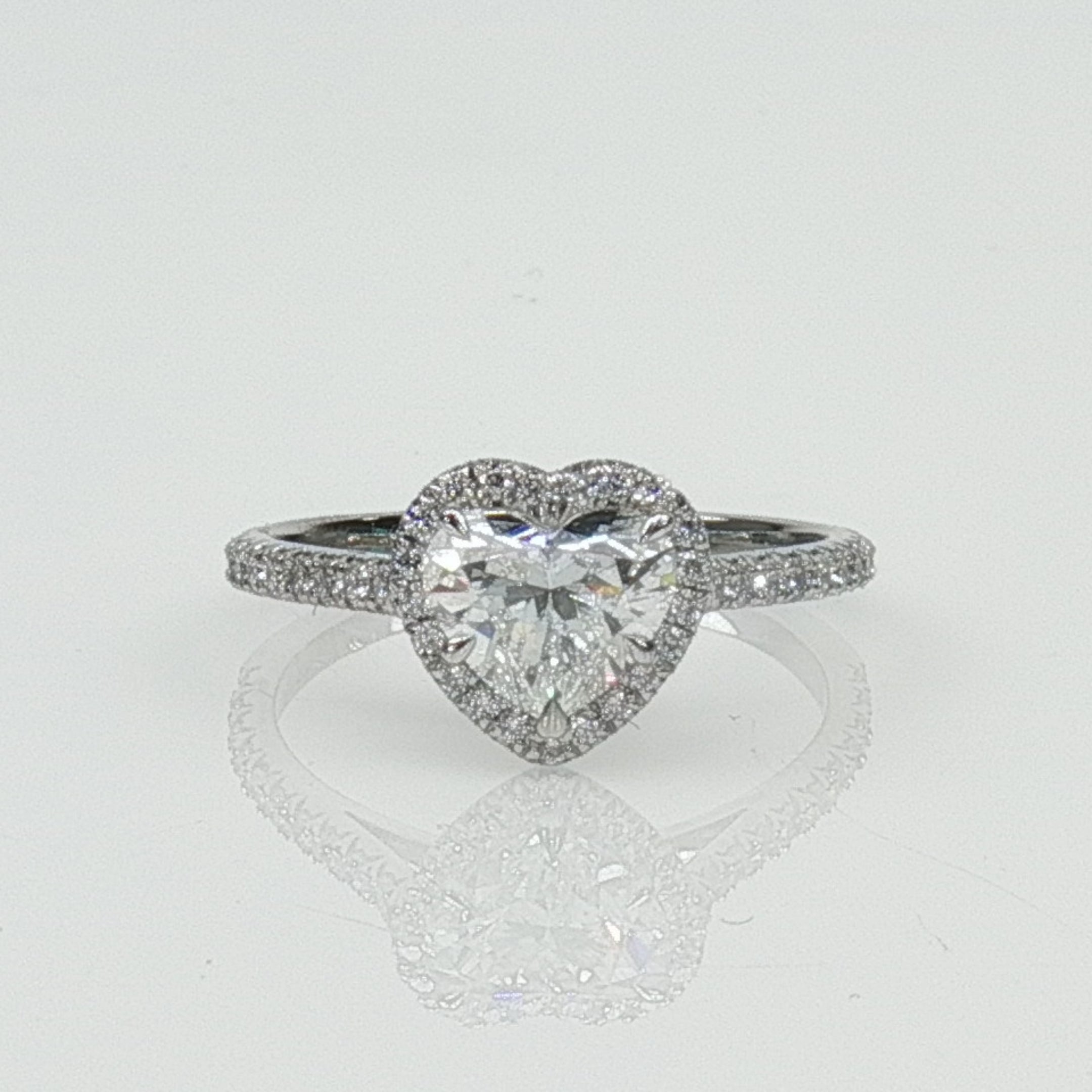 Gold & Beyond Tiffany & Co. Soleste heart-shaped diamond ring featuring a sparkling diamond set in elegant jewelry style.