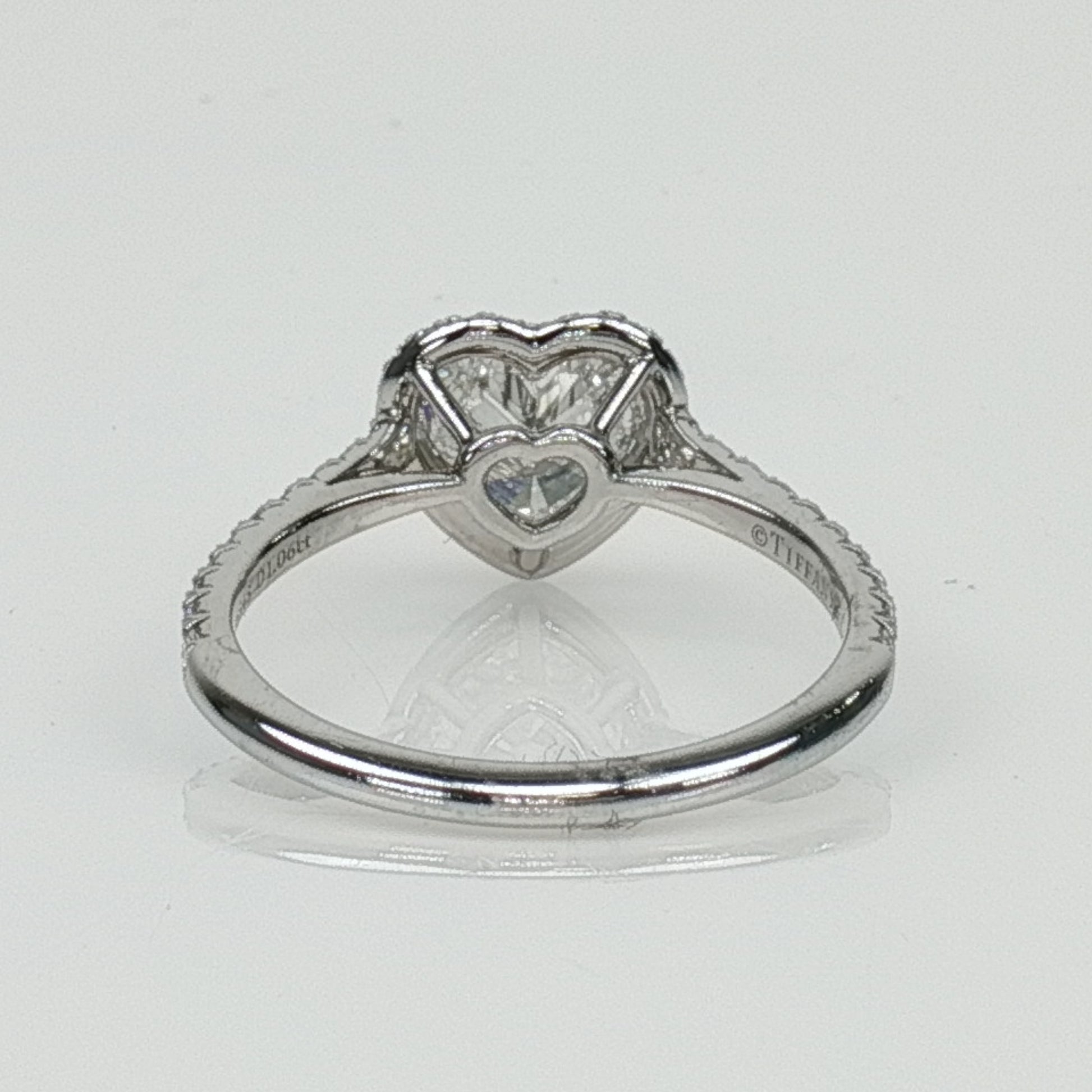 Gold & Beyond Tiffany & Co. Soleste heart-shaped diamond ring, elegant jewelry with a sparkling diamond centerpiece.