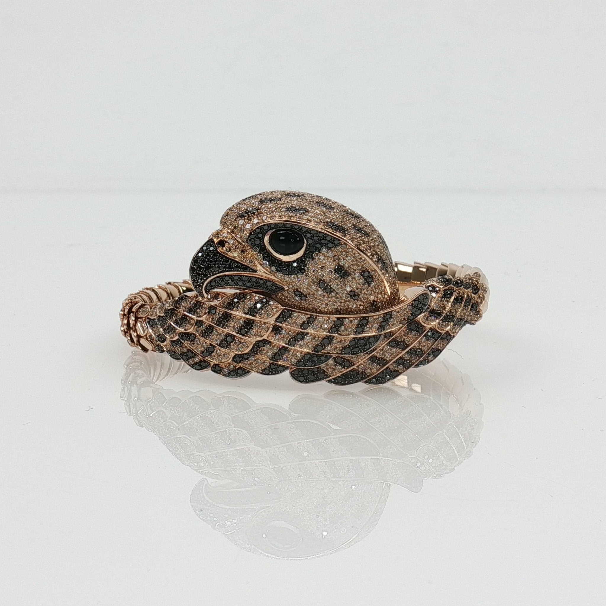 Roberto Coin Falcon diamond bracelet featuring gold jewelry with sparkling diamonds, elegant and luxurious design.