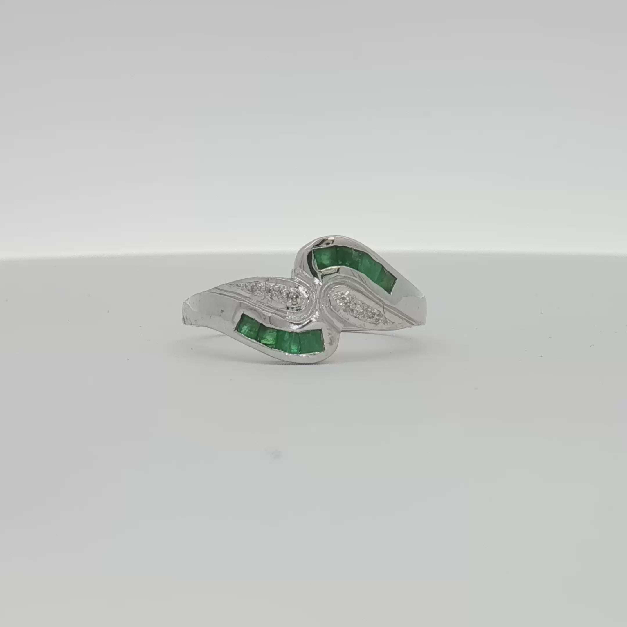 Load video: 14K White Gold Emerald &amp; Diamond Bypass Ring