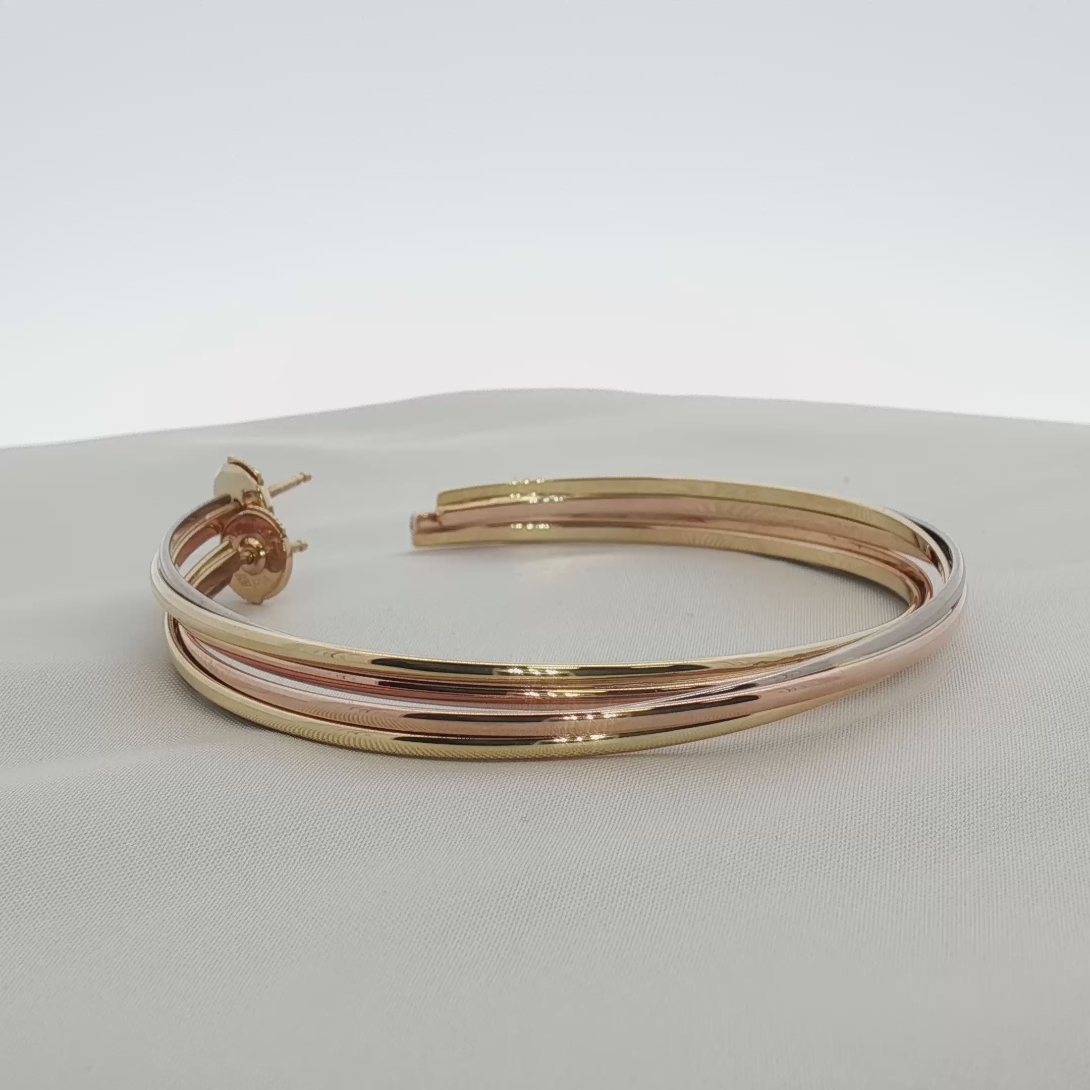 Load video: Cartier Trinity Hoop Earrings