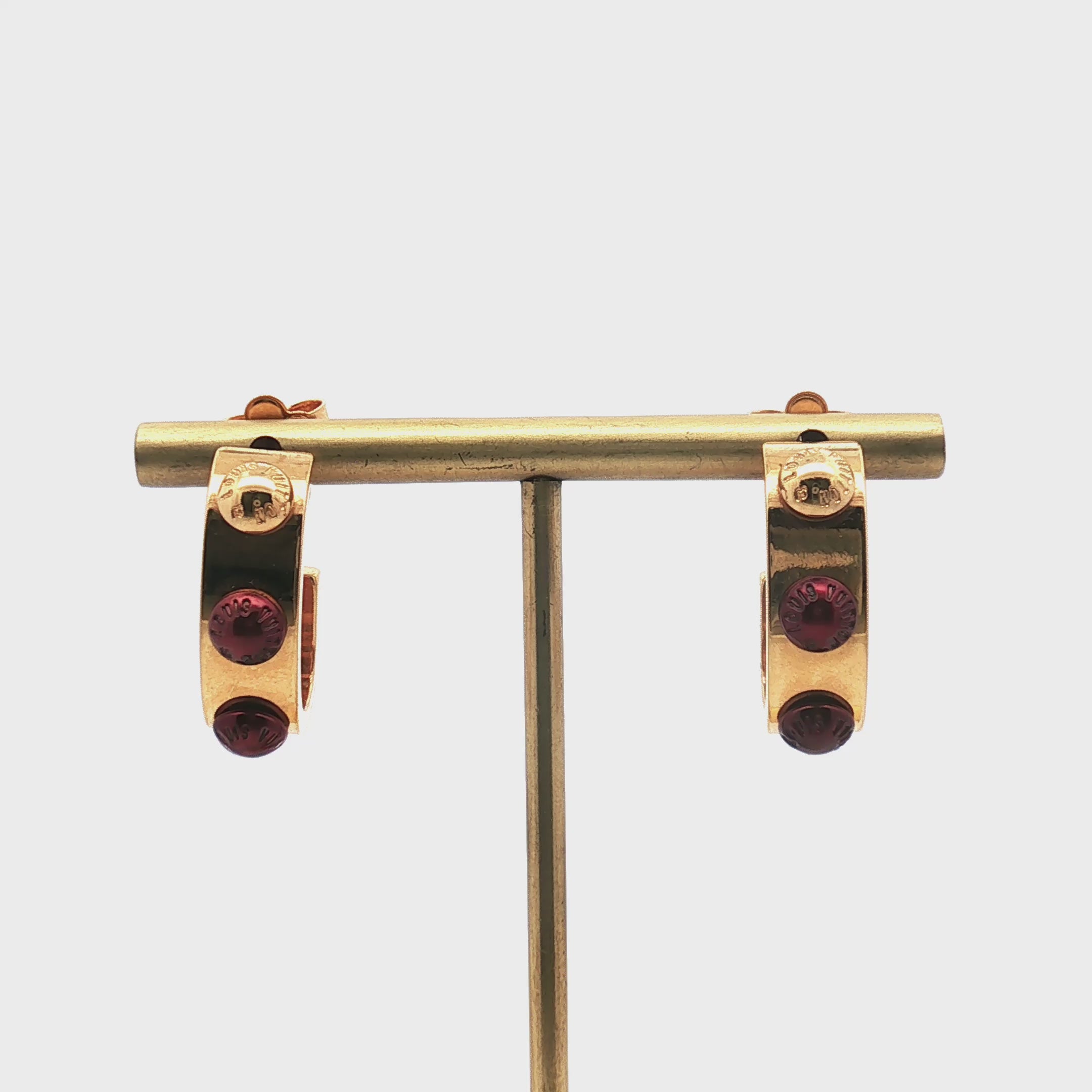 Load video: Louis Vuitton Gold-Tone Red Resin Hoop Earrings