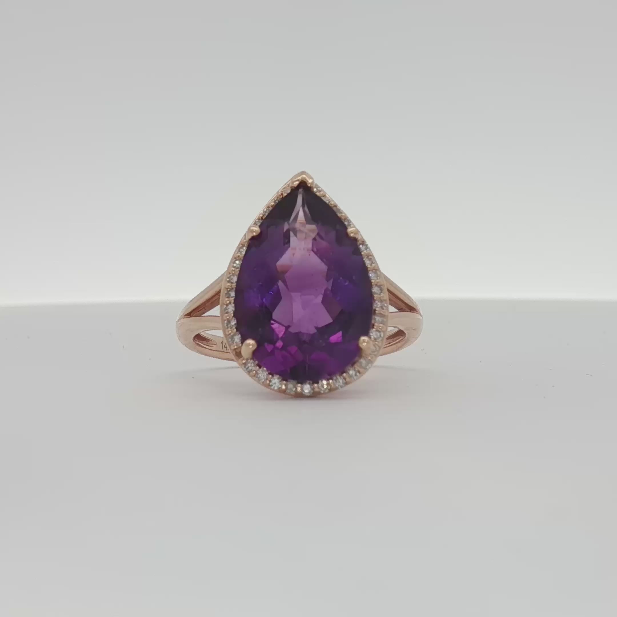 Load video: 14K Yellow Gold Amethyst &amp; Diamond Halo Ring