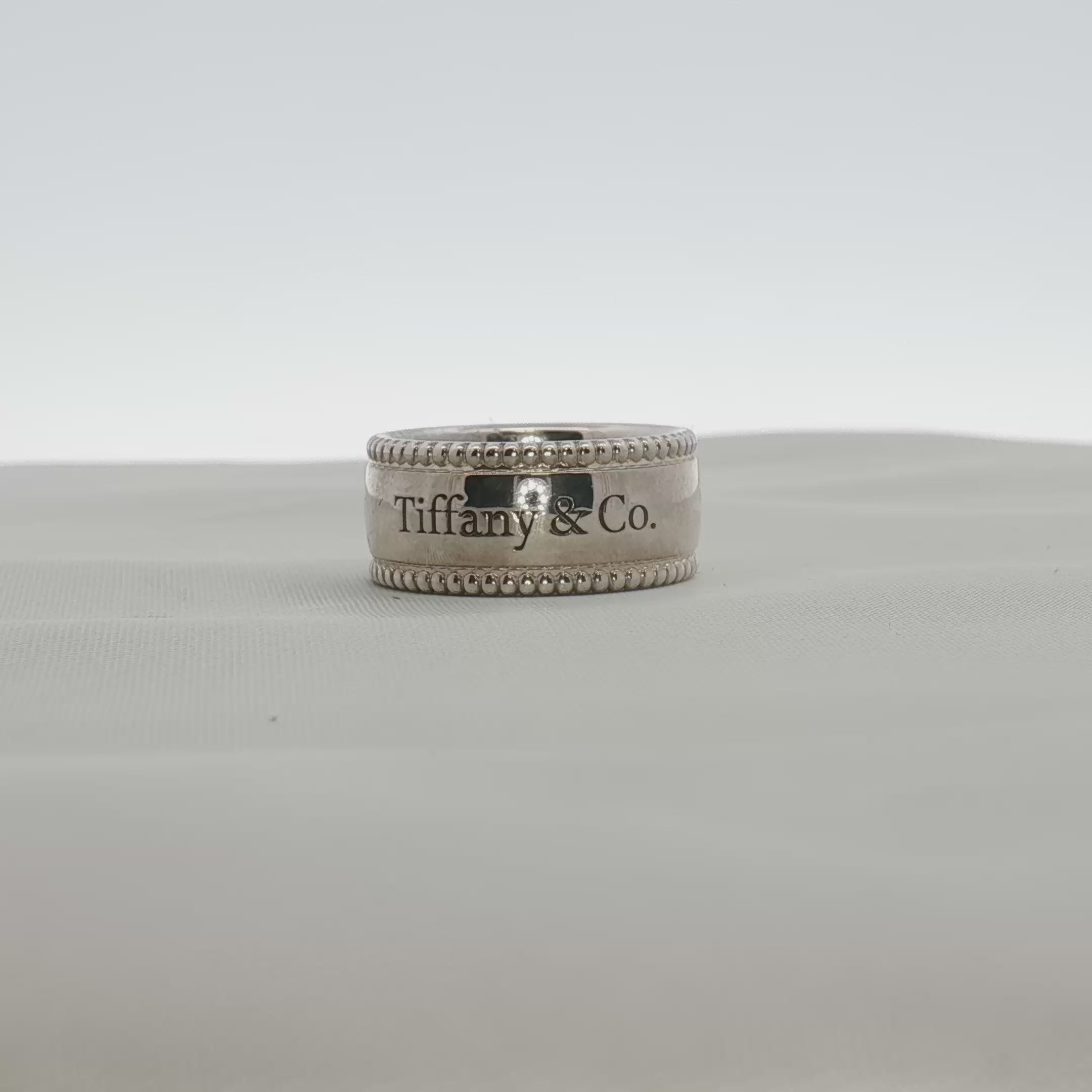 Load video: Tiffany &amp; Co. Sterling Silver Milgrain Band