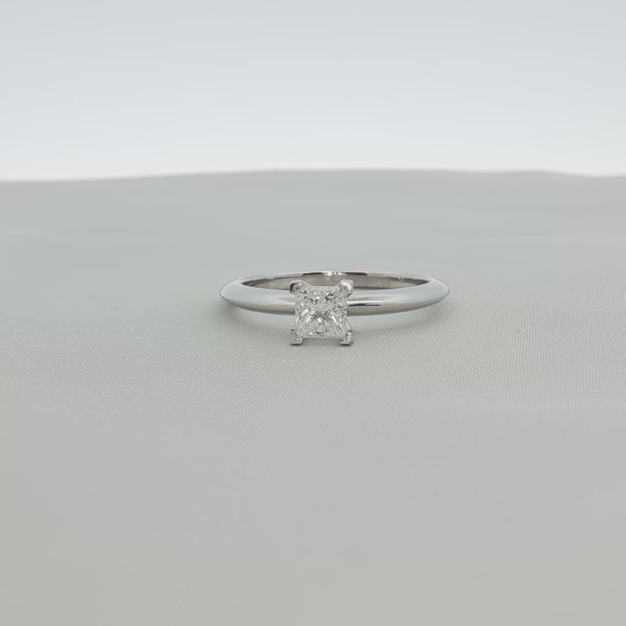 Load video: Tiffany &amp; Co. Platinum Diamond Solitaire Ring