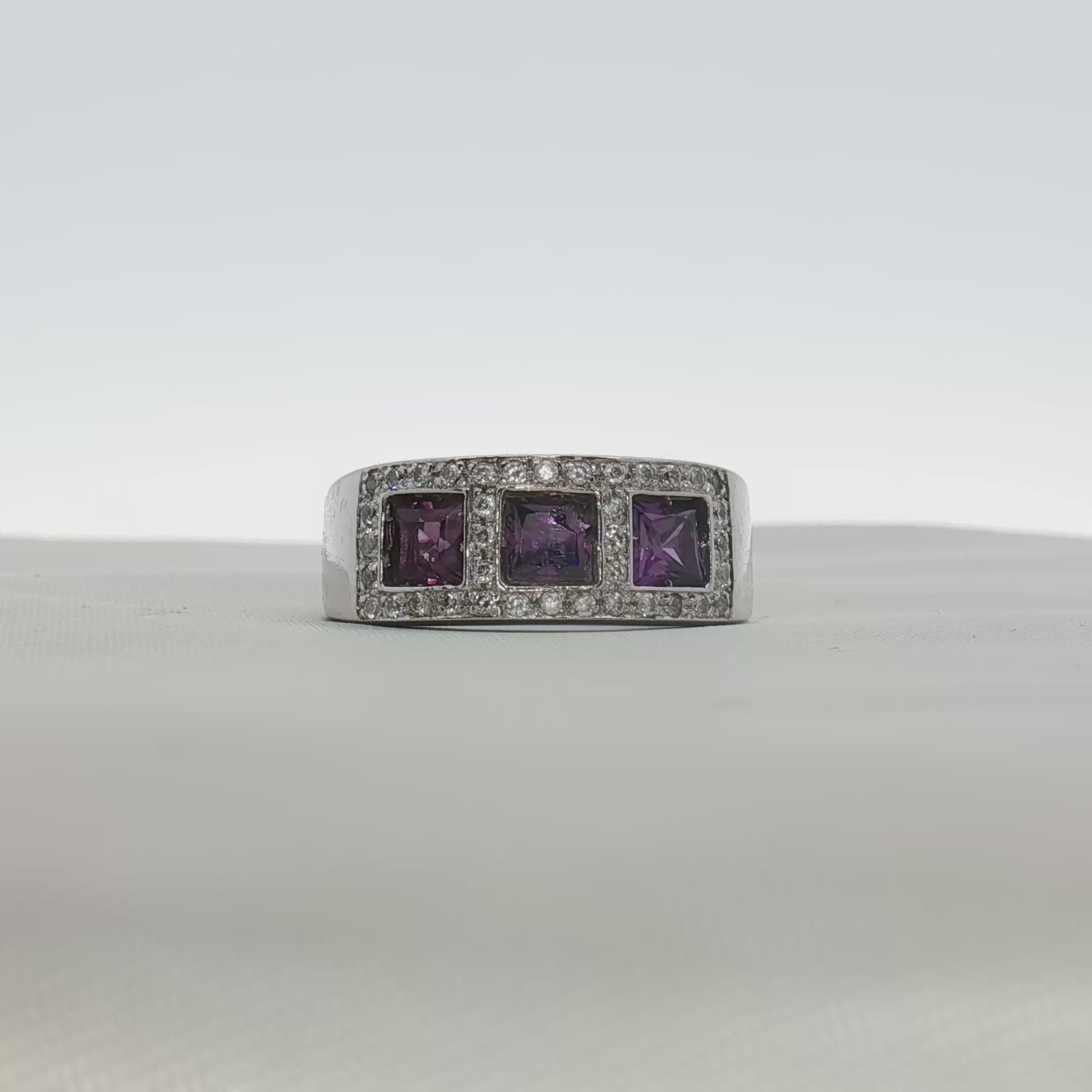 Load video: Three-Stone Diamond &amp; Purple Gemstone Ring