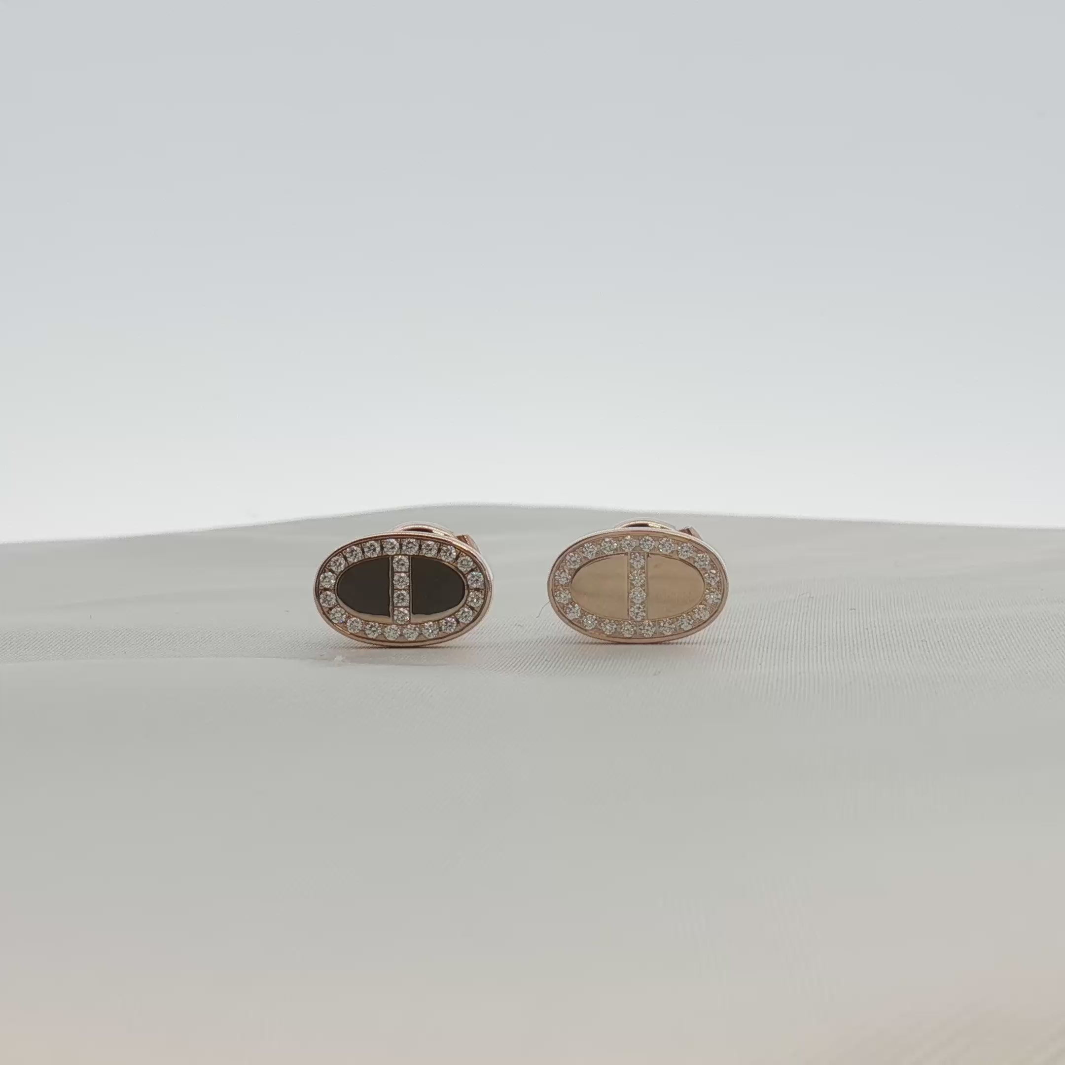 Load video: Hermès Oval Diamond Stud Earrings