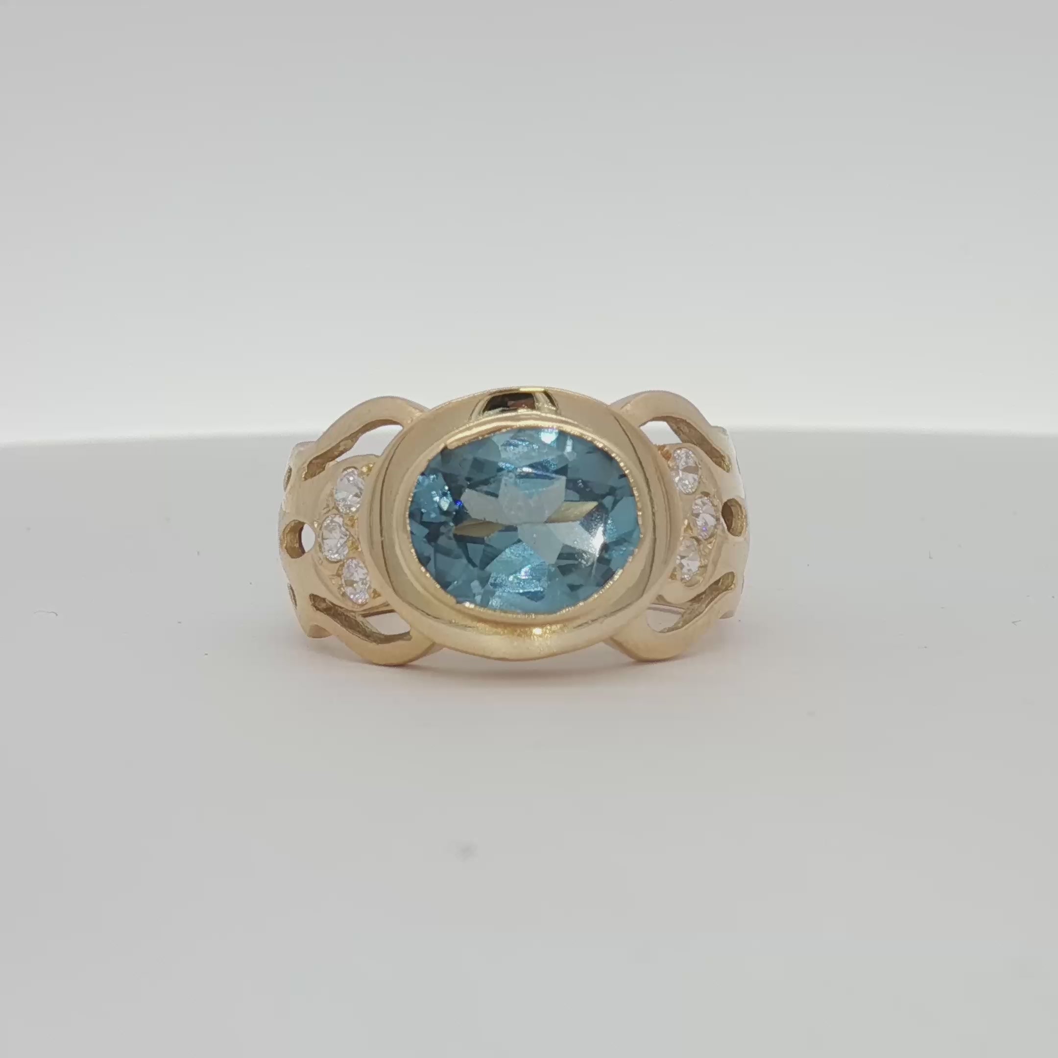 Load video: 18K Yellow Gold Oval Blue Gemstone &amp; Diamond Ring