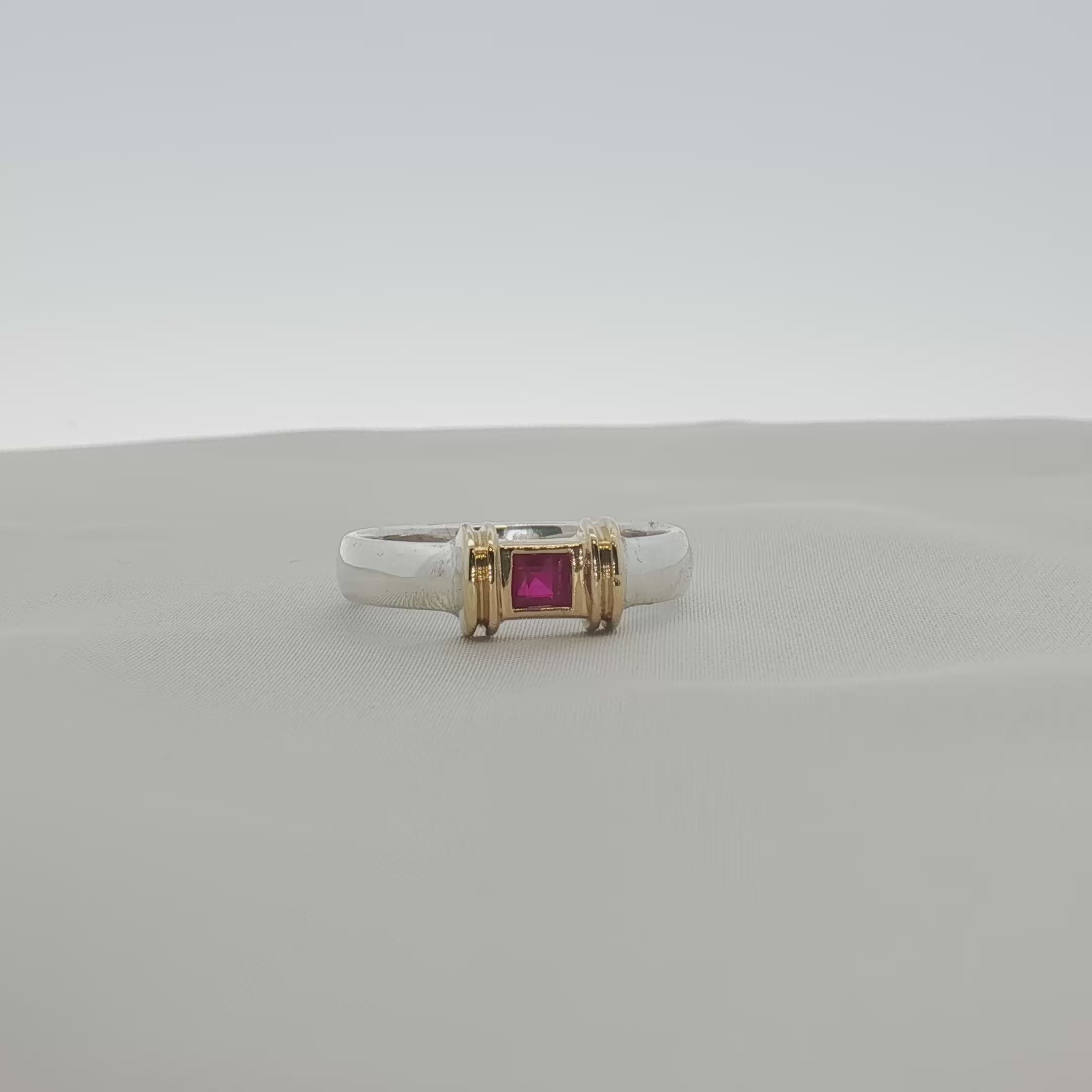 Load video: Tiffany &amp; Co. Two-Tone Sterling Silver &amp; 18K Gold Ruby Ring