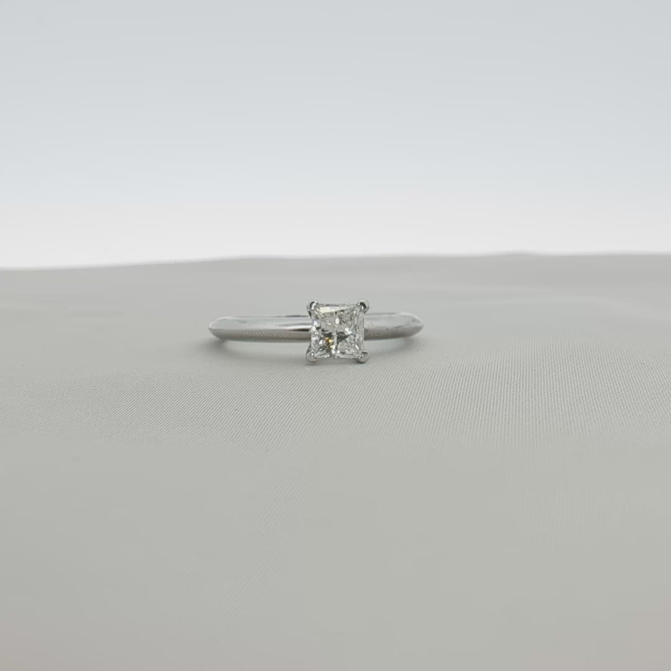 Load video: Tiffany &amp; Co. Princess-Cut Diamond Solitaire Ring