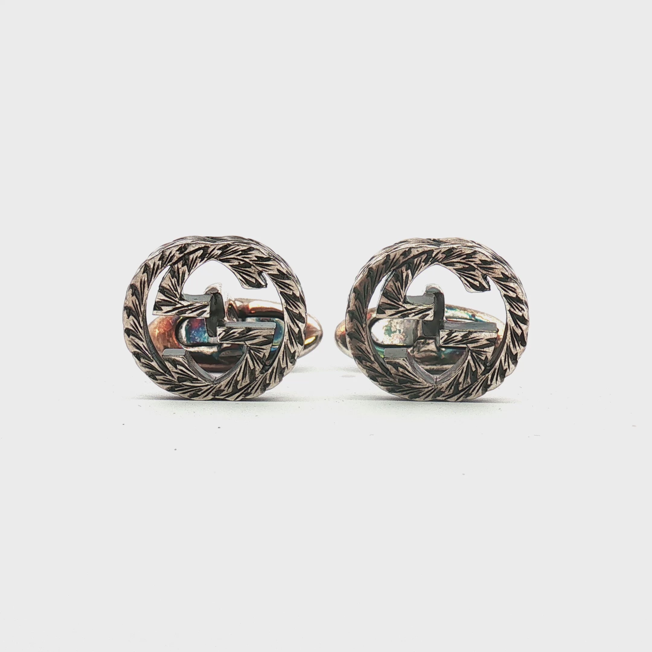 Load video: Gucci Sterling Silver Interlocking G Cufflinks