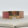 Hermès Wide H Bracelet in Peach Enamel and Yellow Gold Tone